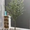 8301-7 (1) Elevate your interior with our gorgeous Artificial Olive Tree. Enjoy the charm of nature in your home or workspace all year round!