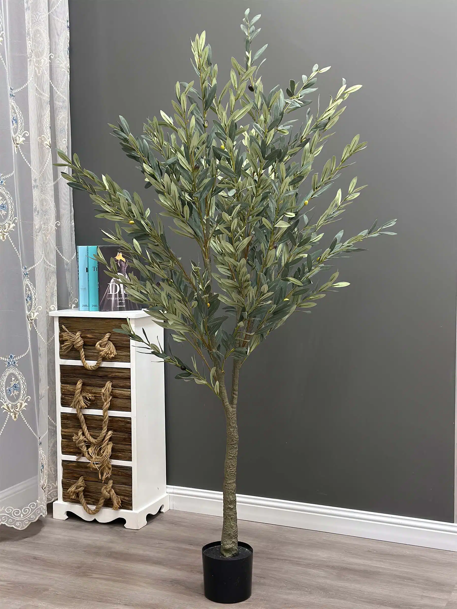 Elevate your interior with our gorgeous Artificial Olive Tree. Enjoy the charm of nature in your home or workspace all year round!