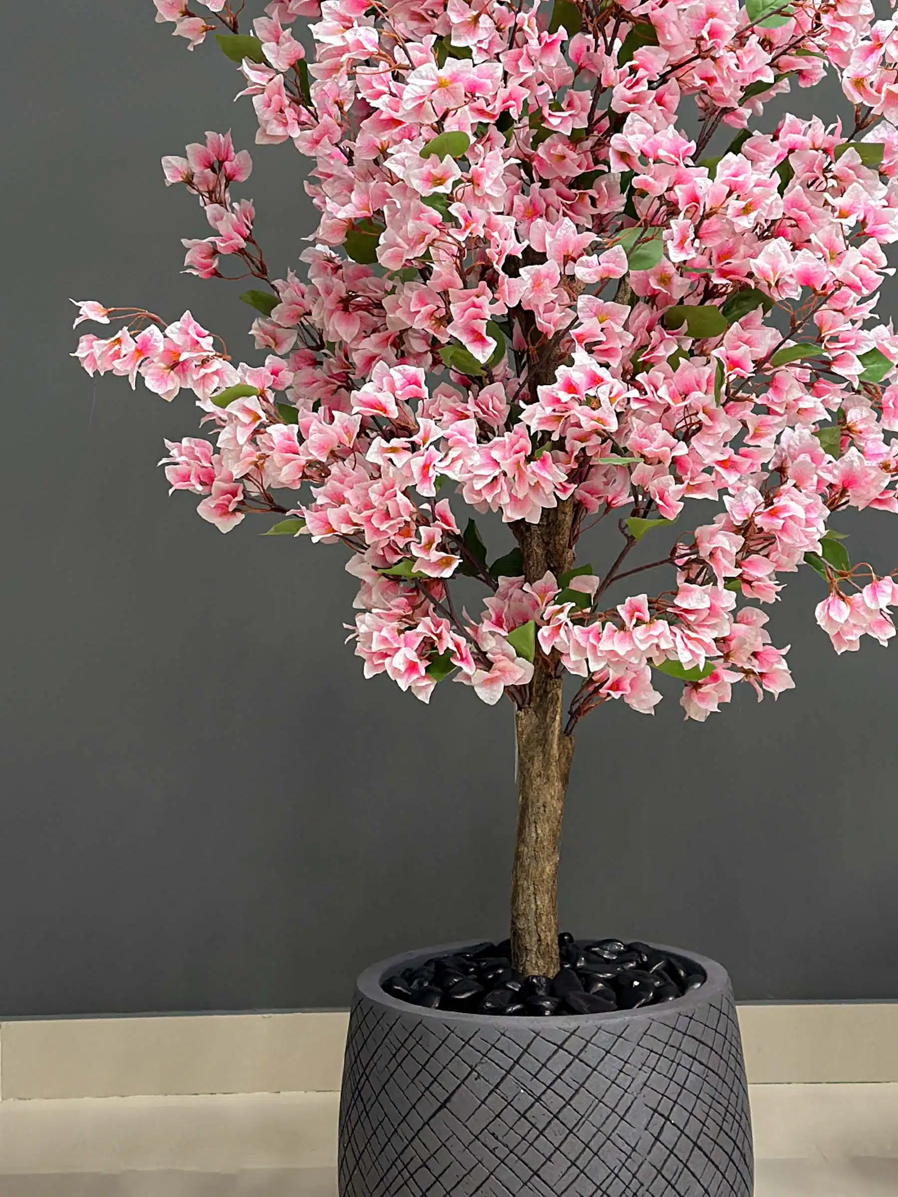 Experience the allure of bougainvillea with our artificial-tree. Realistic look, vibrant hues – a stunning addition to any room!