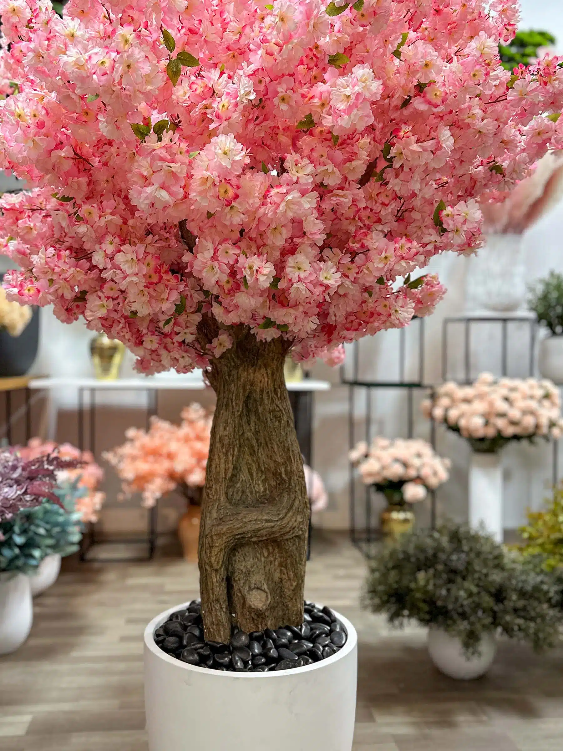 Transform your space with the stunning Artificial Pink Cherry Blossom Tree. Bring nature indoors effortlessly and enjoy everlasting beauty!