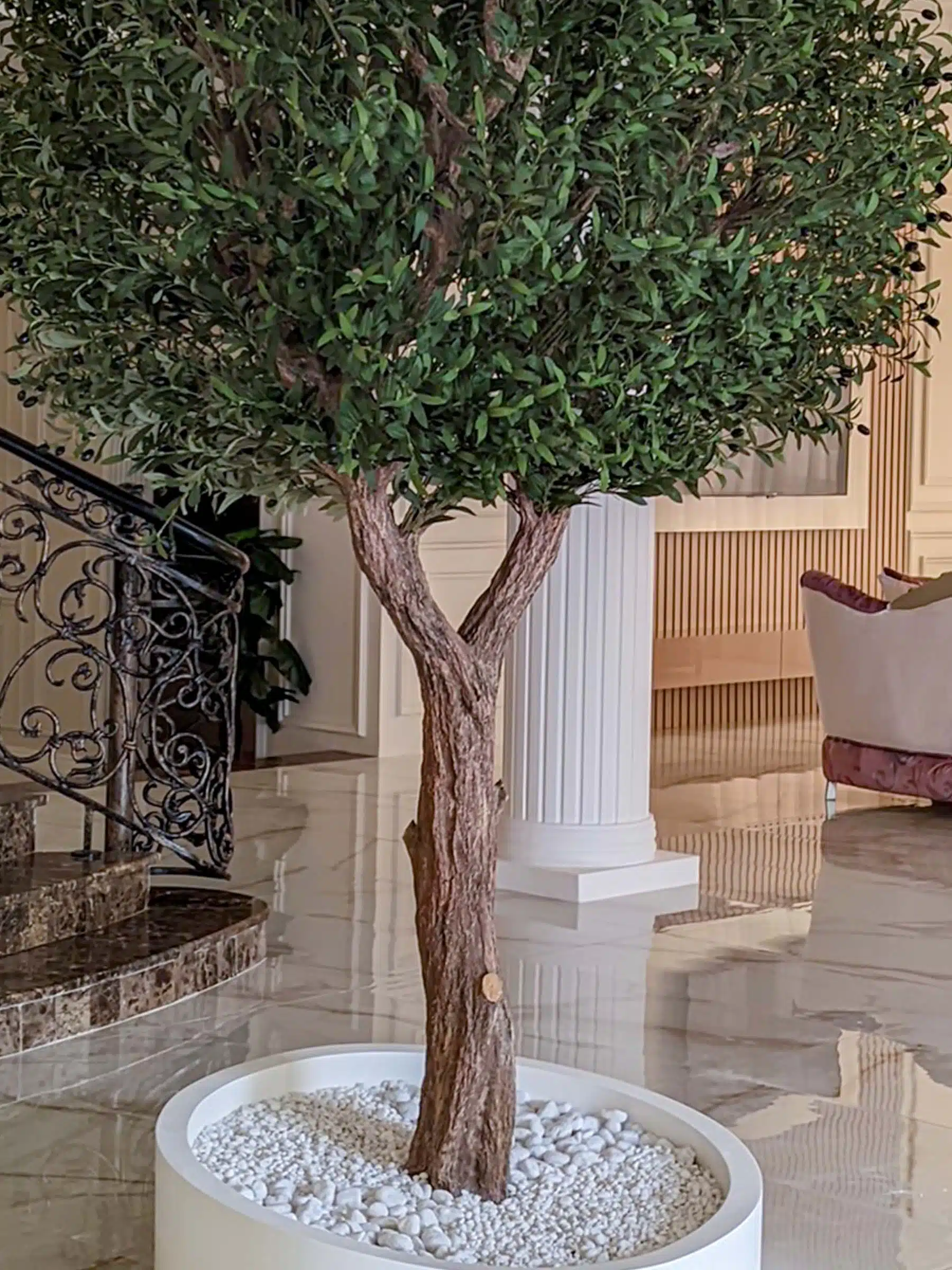 Elevate your interior with our gorgeous Artificial Olive Tree. Enjoy the charm of nature in your home or workspace all year round!