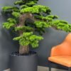 Elevate your space with this stunning Artificial Bonsai Tree! Its realistic design and stylish pot will bring everlasting beauty to any setting.