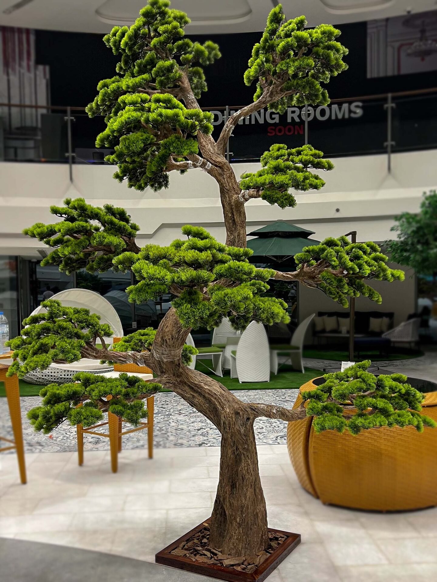 Elevate your space with this stunning Artificial Bonsai Tree! Its realistic design and stylish pot will bring everlasting beauty to any setting.