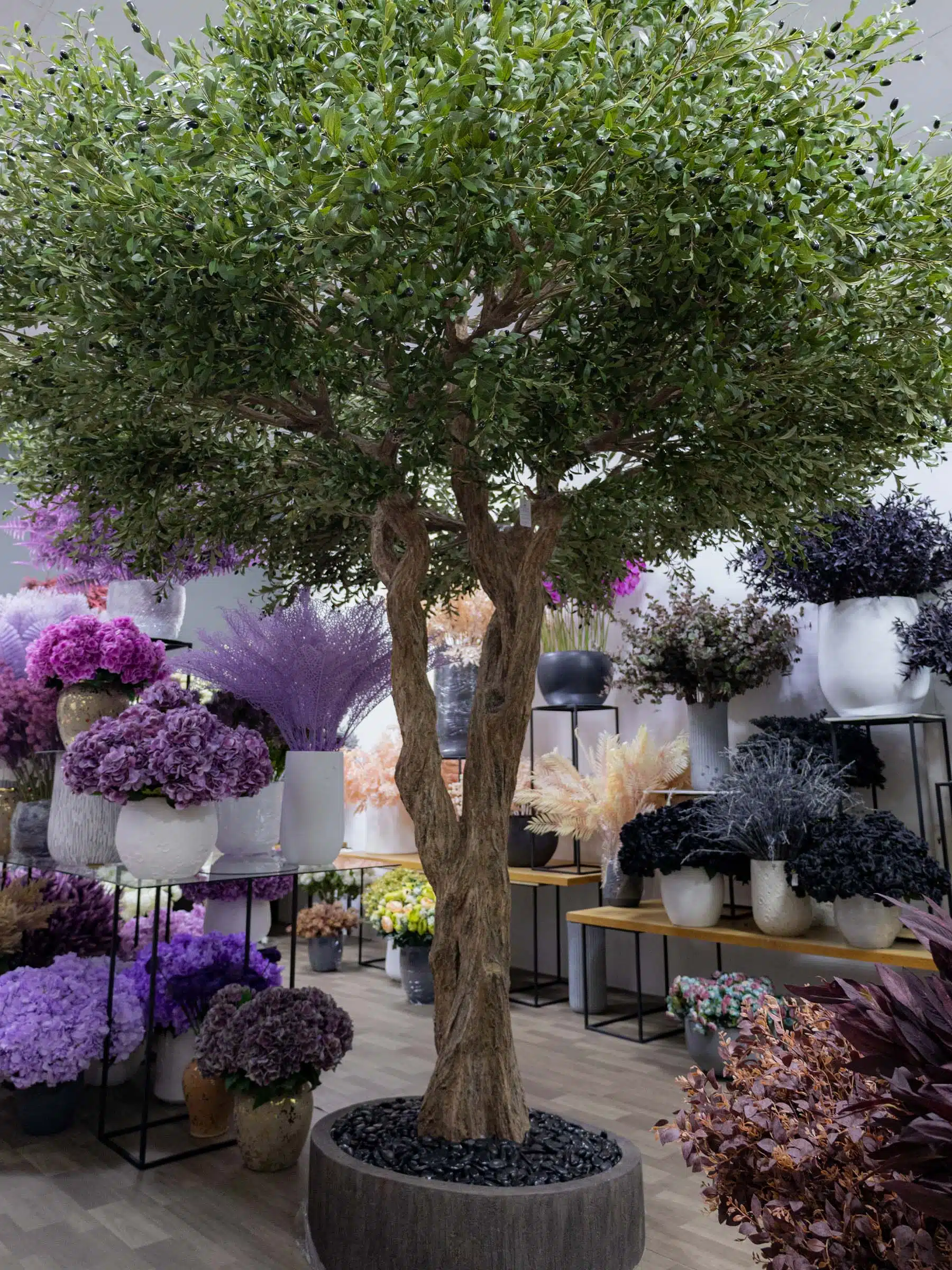 Elevate your interior with our gorgeous Artificial Olive Tree. Enjoy the charm of nature in your home or workspace all year round!