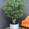 9656(1) Elevate your interior with our gorgeous Artificial Olive Tree. Enjoy the charm of nature in your home or workspace all year round!