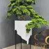 9603 Elevate your space with this stunning Artificial Bonsai Tree! Its realistic design and stylish pot will bring everlasting beauty to any setting.