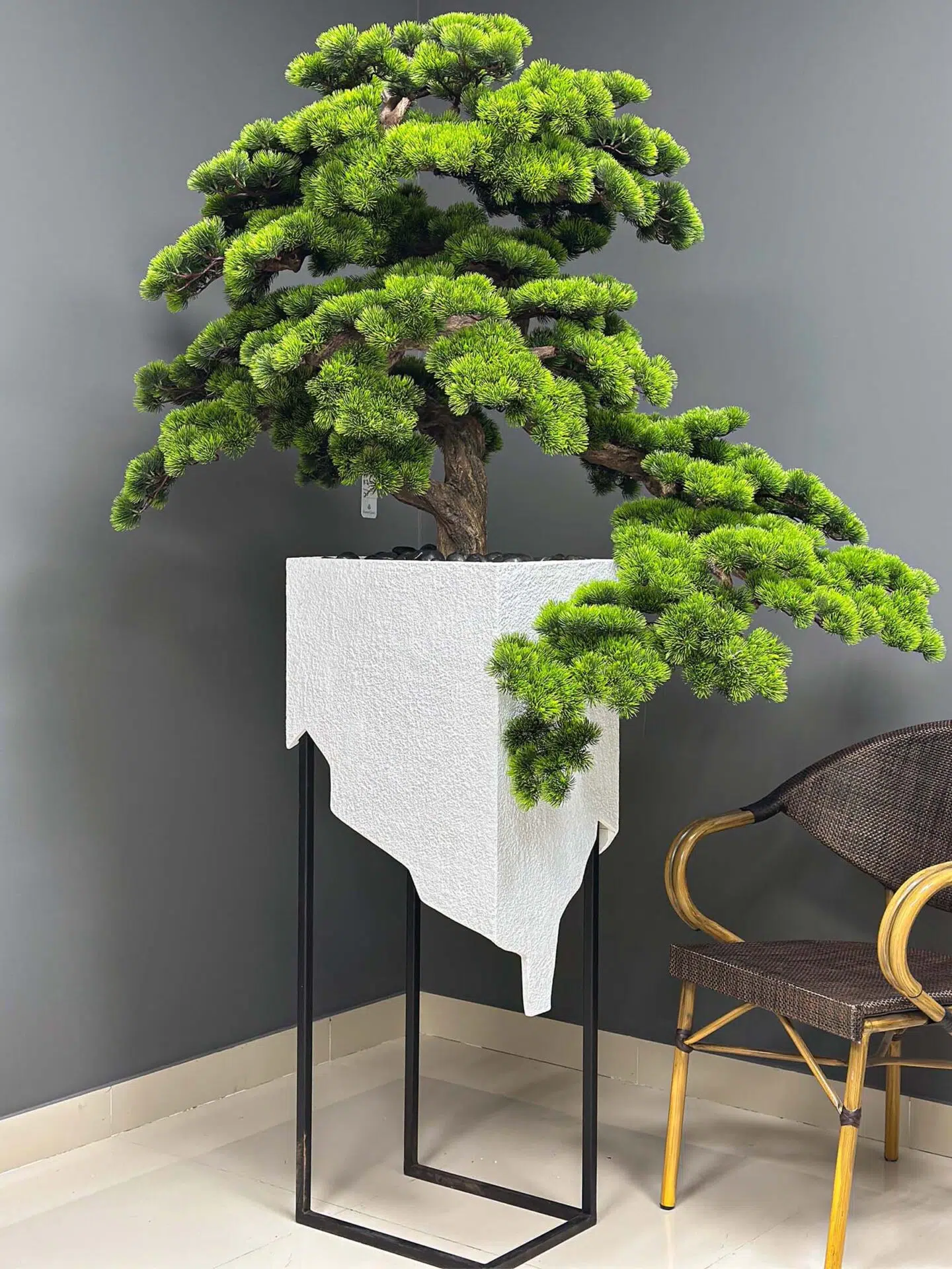 Elevate your space with this stunning Artificial Bonsai Tree! Its realistic design and stylish pot will bring everlasting beauty to any setting.