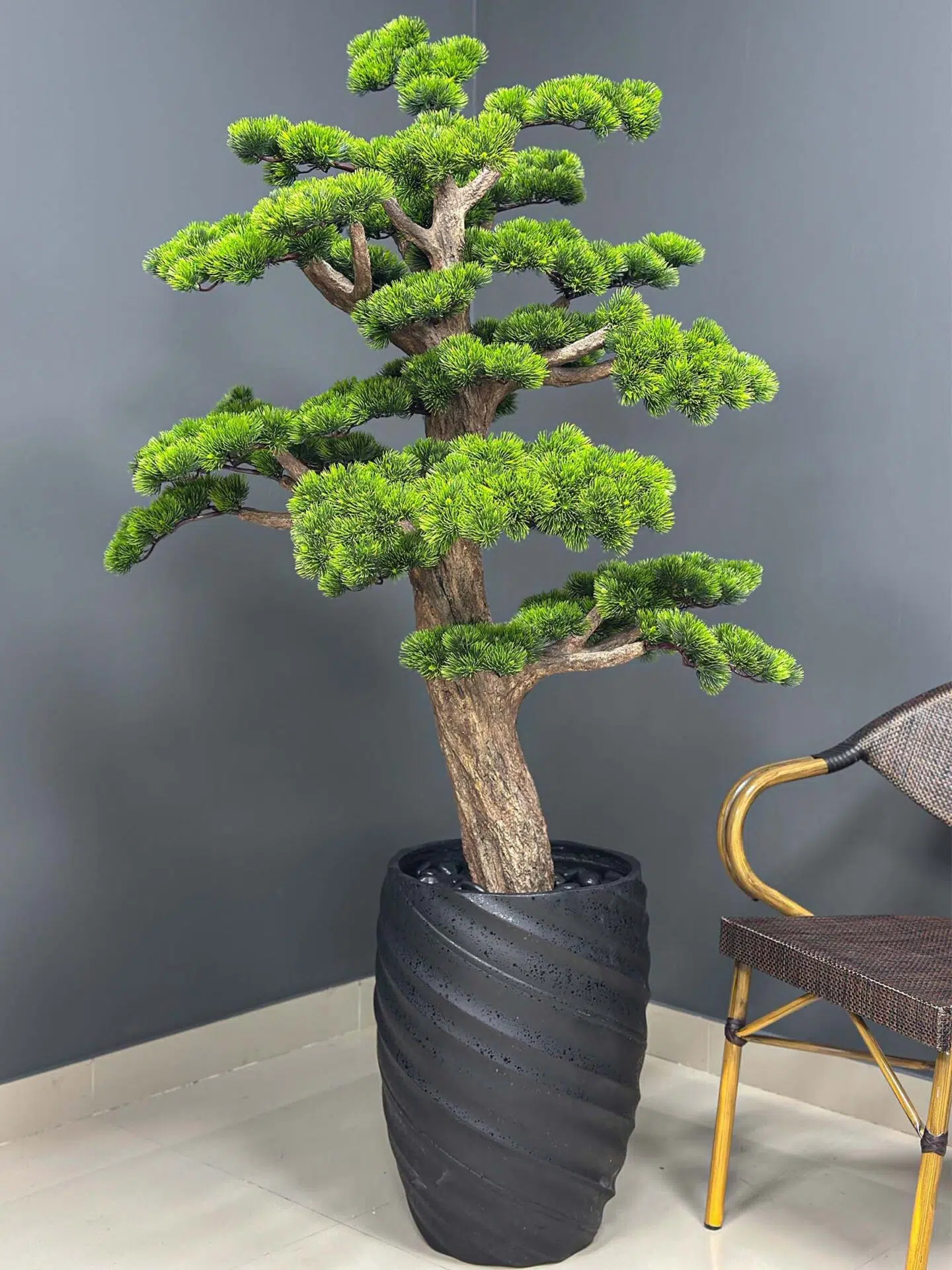 Elevate your space with this stunning Artificial Bonsai Tree! Its realistic design and stylish pot will bring everlasting beauty to any setting.