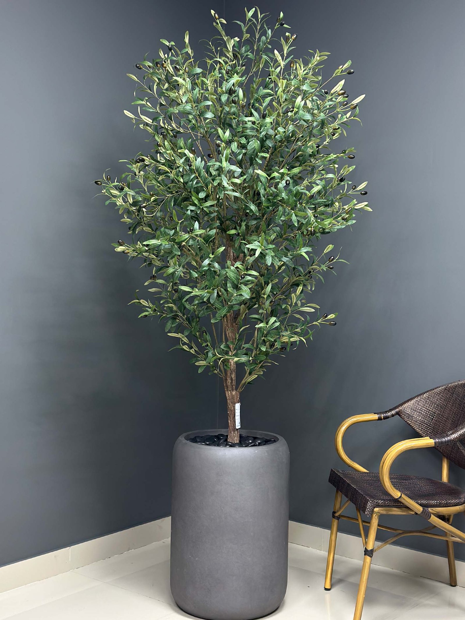 Elevate your interior with our gorgeous Artificial Olive Tree. Enjoy the charm of nature in your home or workspace all year round!
